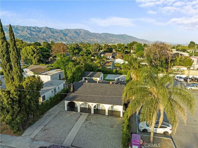 birds eye view of property with a residential view and a mountain view