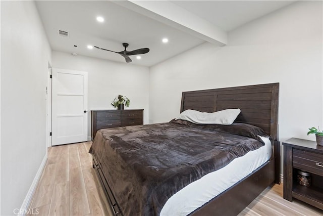 bedroom featuring beam ceiling, recessed lighting, visible vents, light wood-style floors, and baseboards