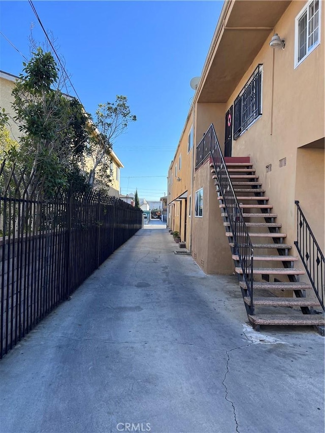 view of road featuring stairs