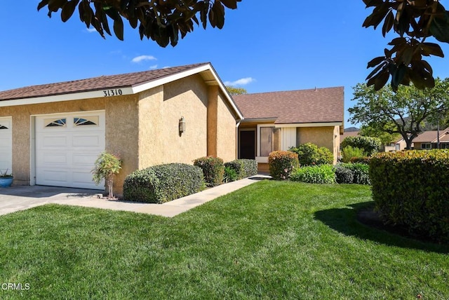 view of home's exterior with an attached garage, a shingled roof, a lawn, and stucco siding