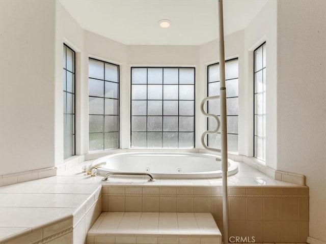 bathroom with a jetted tub