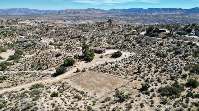 bird's eye view featuring a mountain view and view of desert