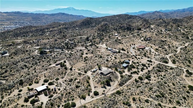 bird's eye view featuring a mountain view and a desert view