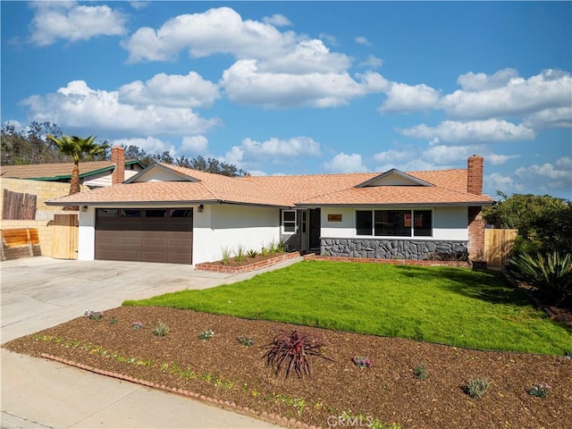 single story home featuring driveway, an attached garage, fence, and stucco siding