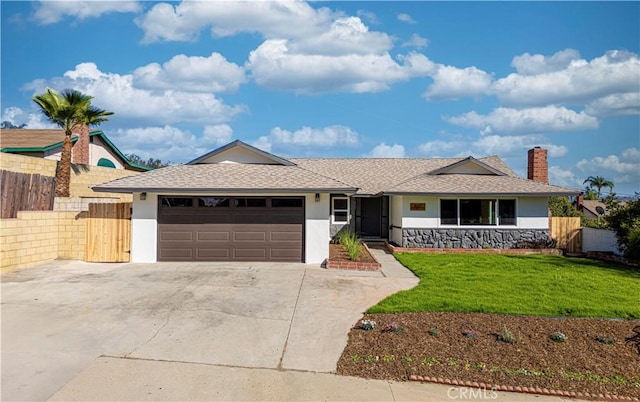 single story home featuring a garage, driveway, fence, and stucco siding