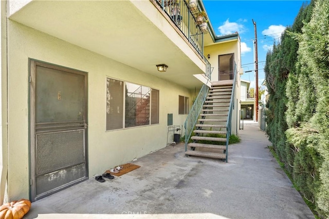 view of patio / terrace featuring stairway