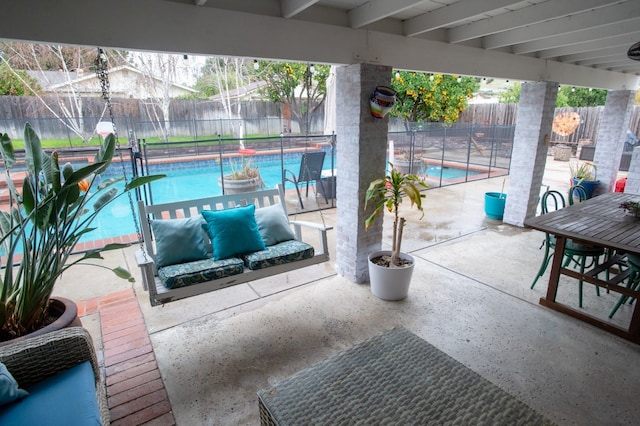 view of patio / terrace featuring a fenced in pool and a fenced backyard