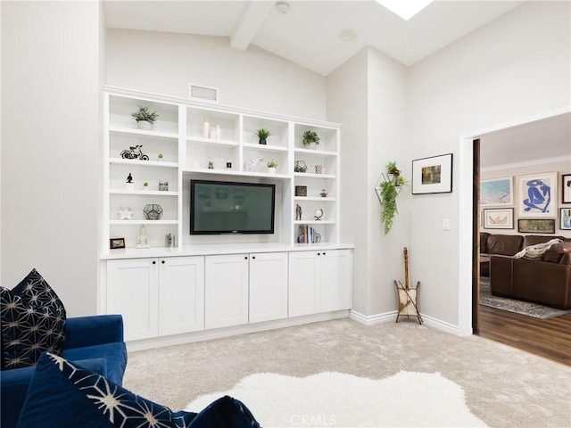 living room featuring light carpet, baseboards, lofted ceiling with beams, and visible vents