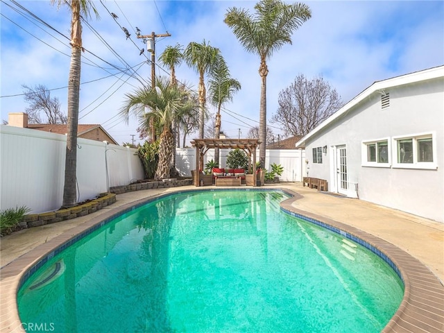 view of pool featuring a patio, a fenced backyard, a fenced in pool, and a pergola