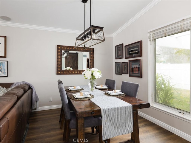 dining room with ornamental molding, baseboards, and dark wood-style floors