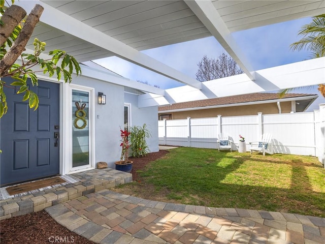 view of yard featuring fence