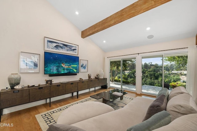 living room with high vaulted ceiling, recessed lighting, beam ceiling, and wood finished floors