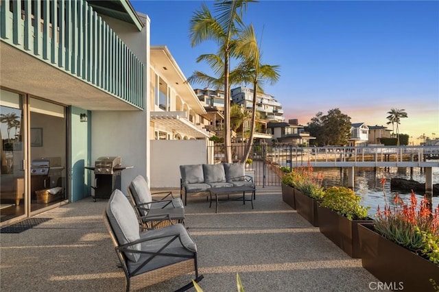115 Bayside Pl Unit 115, Corona Del Mar, CA 92625 - view of patio with a water view, fence, an outdoor living space, and area for grilling