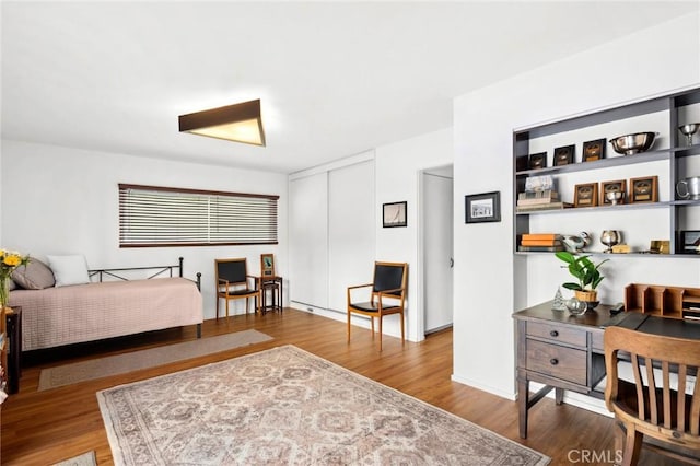 115 Bayside Pl Unit 115, Corona Del Mar, CA 92625 - bedroom with a closet and wood finished floors