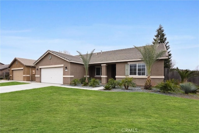 single story home featuring an attached garage, fence, concrete driveway, stucco siding, and a front yard