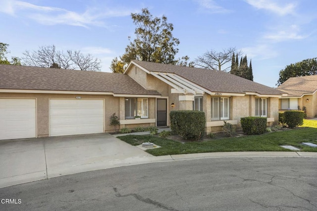 ranch-style home featuring driveway, roof with shingles, an attached garage, and stucco siding