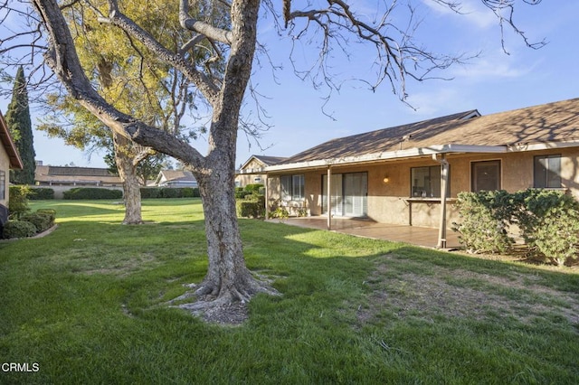 view of yard with a patio area