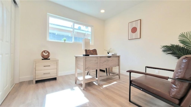 office area featuring light wood-type flooring, baseboards, and recessed lighting