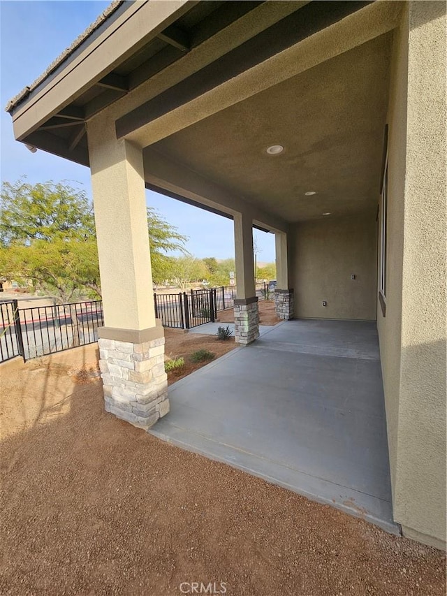 view of patio / terrace with fence