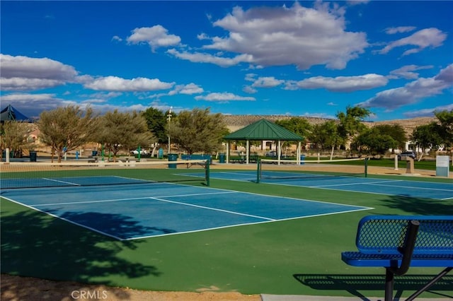 view of sport court with a gazebo