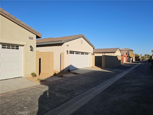 view of property exterior with stucco siding