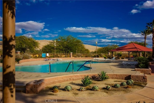 67813 Rio Vista Dr, Cathedral City, CA 92234 - community pool featuring a gazebo, a patio area, and a mountain view