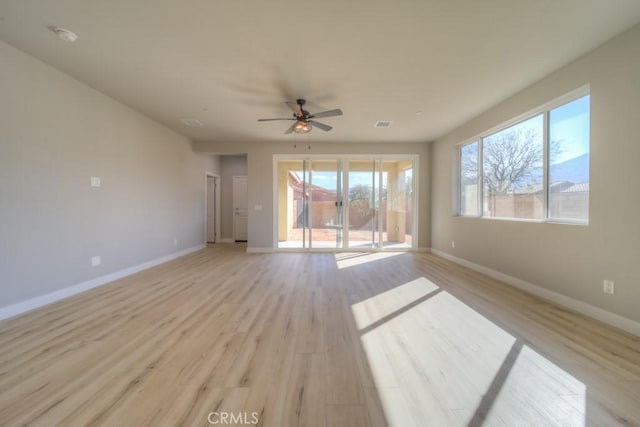 67813 Rio Vista Dr, Cathedral City, CA 92234 - unfurnished living room featuring a ceiling fan and light wood finished floors