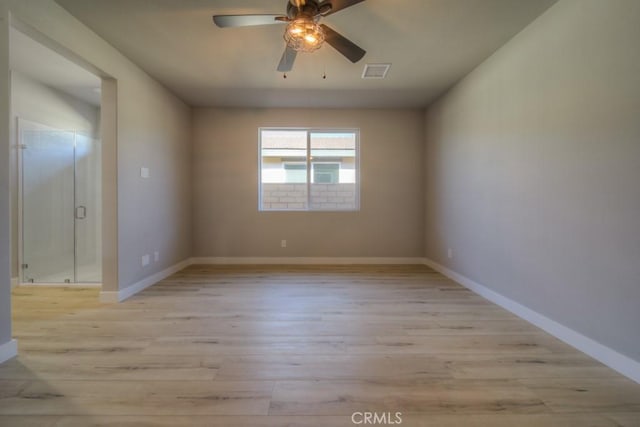 67813 Rio Vista Dr, Cathedral City, CA 92234 - empty room featuring light wood-style floors and ceiling fan