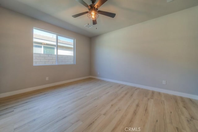 67813 Rio Vista Dr, Cathedral City, CA 92234 - empty room featuring light wood finished floors and ceiling fan
