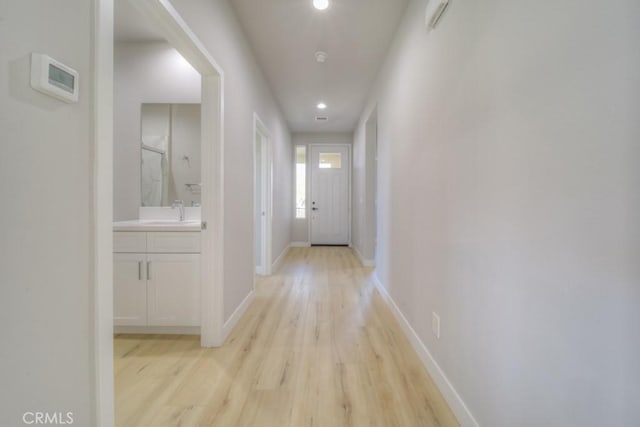 67813 Rio Vista Dr, Cathedral City, CA 92234 - hallway featuring light wood finished floors and recessed lighting