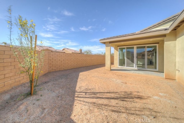67813 Rio Vista Dr, Cathedral City, CA 92234 - fenced backyard featuring a patio area