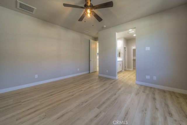 67813 Rio Vista Dr, Cathedral City, CA 92234 - empty room with a ceiling fan and light wood-style flooring