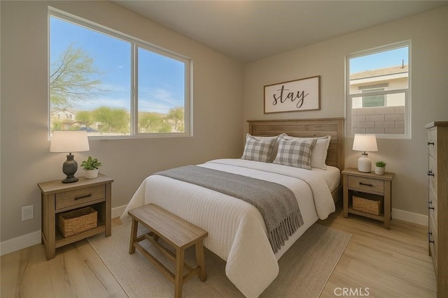 67813 Rio Vista Dr, Cathedral City, CA 92234 - bedroom featuring light wood-style floors and baseboards
