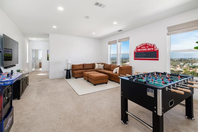 game room with a wealth of natural light, visible vents, and recessed lighting