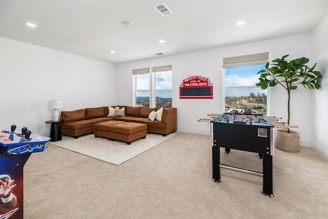 rec room featuring carpet floors, recessed lighting, visible vents, and baseboards