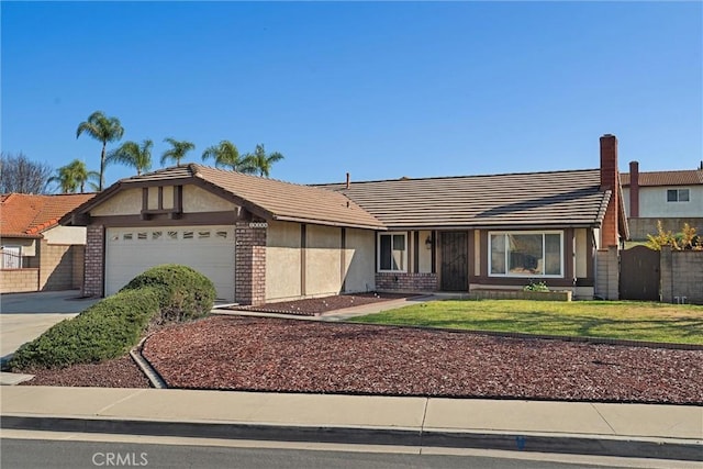 ranch-style home with driveway, brick siding, an attached garage, and stucco siding