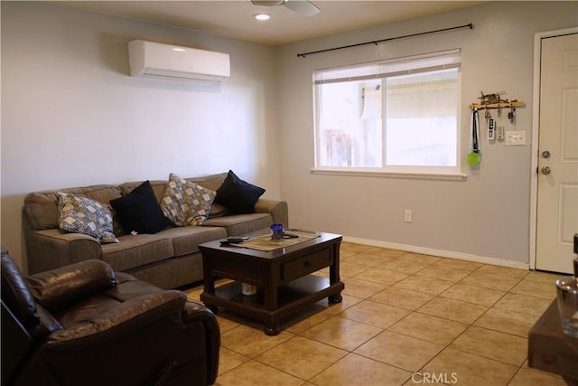 living area featuring light tile patterned floors, a ceiling fan, baseboards, a wall mounted AC, and recessed lighting