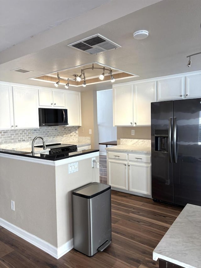 kitchen with range with electric cooktop, black fridge with ice dispenser, visible vents, white cabinets, and dark wood finished floors