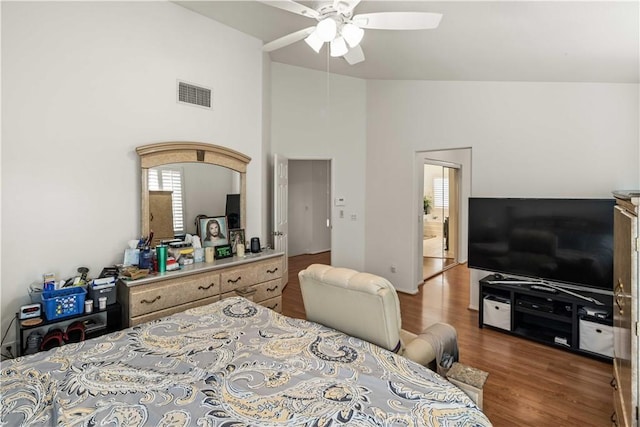 23718 Hathaway Dr, Valencia, CA 91354 - bedroom with wood finished floors, high vaulted ceiling, a ceiling fan, and ensuite bath