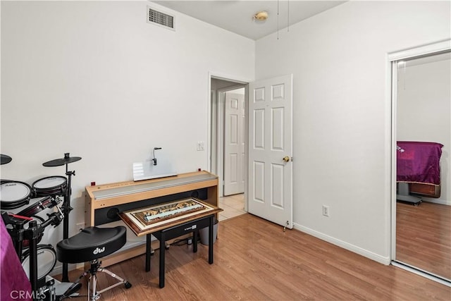 23718 Hathaway Dr, Valencia, CA 91354 - home office featuring light wood-type flooring and baseboards