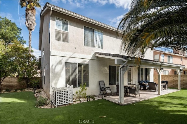 23718 Hathaway Dr, Valencia, CA 91354 - rear view of house featuring stucco siding, a patio area, and outdoor lounge area