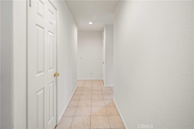 23718 Hathaway Dr, Valencia, CA 91354 - corridor with light tile patterned flooring, baseboards, and recessed lighting