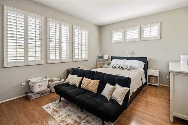 23718 Hathaway Dr, Valencia, CA 91354 - bedroom with wood finished floors and baseboards