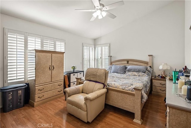 23718 Hathaway Dr, Valencia, CA 91354 - bedroom featuring wood finished floors, lofted ceiling, and ceiling fan