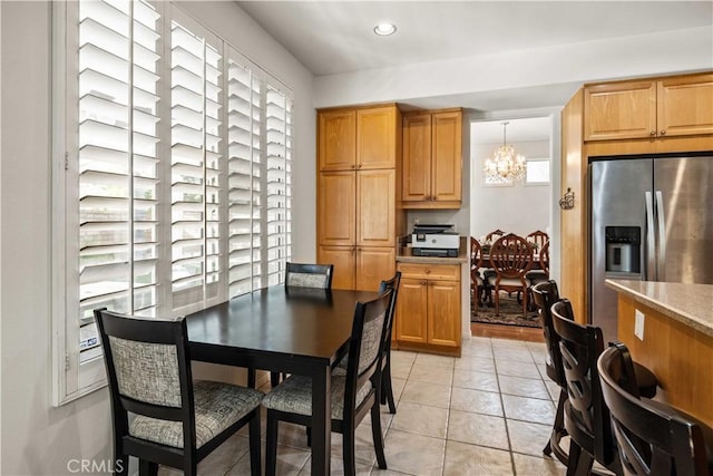 23718 Hathaway Dr, Valencia, CA 91354 - dining area featuring a chandelier, recessed lighting, and light tile patterned floors
