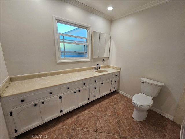 bathroom with toilet, recessed lighting, vanity, baseboards, and ornamental molding