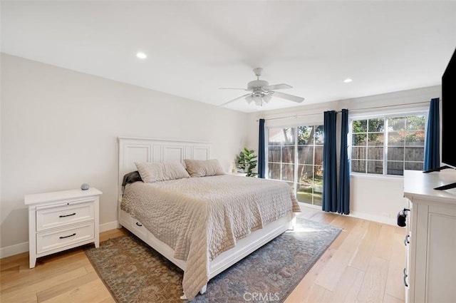 bedroom featuring ceiling fan, light wood finished floors, recessed lighting, and baseboards