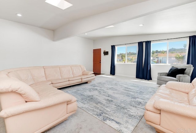 living area with beam ceiling, a skylight, light colored carpet, and recessed lighting