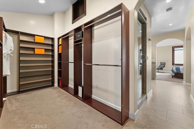 31422 Ceanothus Dr, Laguna Beach, CA 92651 - hallway with arched walkways, recessed lighting, and tile patterned flooring