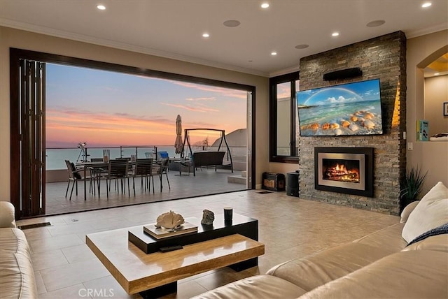 interior space featuring ornamental molding, recessed lighting, light tile patterned flooring, and a fireplace